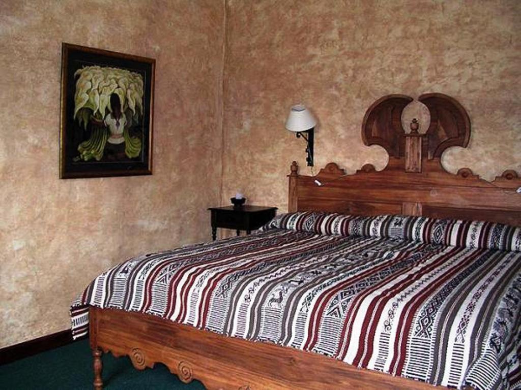 Las Palmeras Inn Отавало Стая снимка